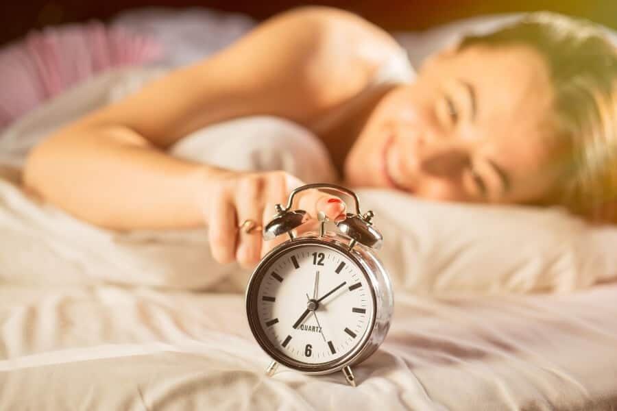 Become a Morning Person Naturally With These Simple Tips | Naturopathic Dr Woman waking up early